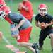 Whitmore Lake football players run a drill during practice at the school on Tuesday, August 13, 2013. Melanie Maxwell | AnnArbor.com